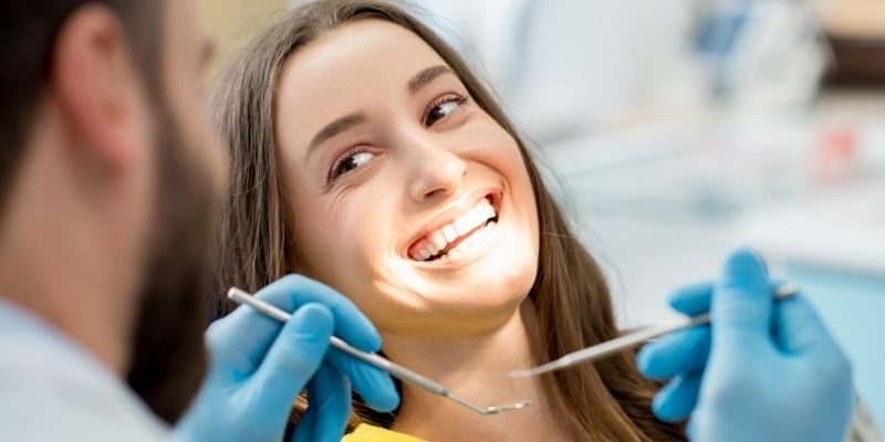 Girl smiling in dental clinic