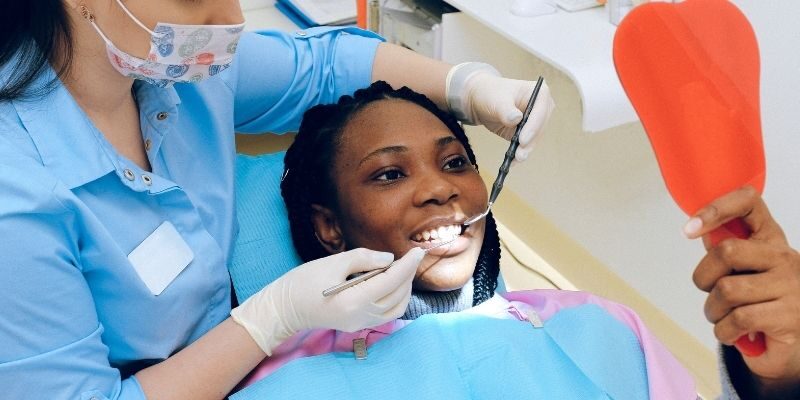 Dentist performing dental fillings in Jacksonville Tx